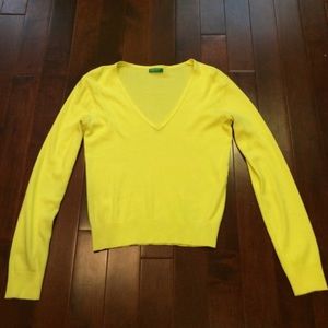 Neon yellow sweater.